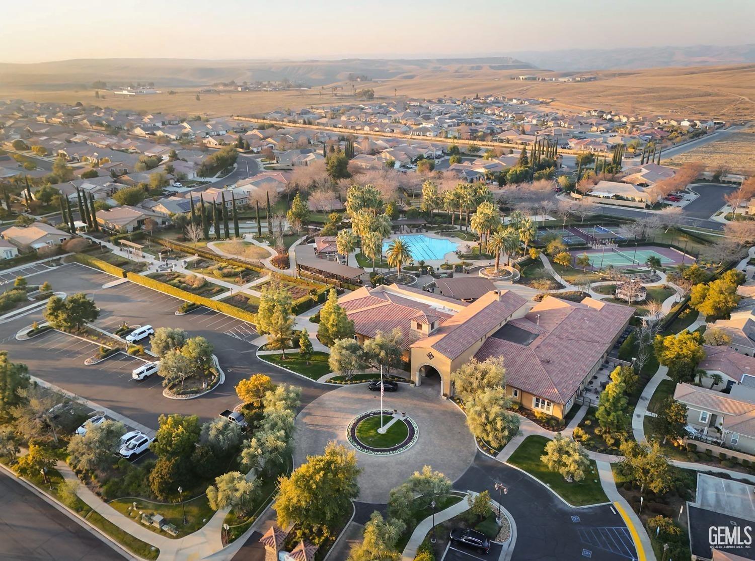Undisclosed Address Bakersfield, CA 93306 - Photo 2 of 51 an aerial view of residential houses with outdoor space
