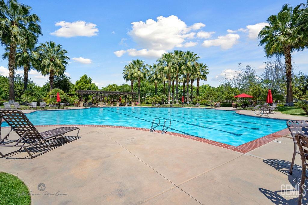 Undisclosed Address Bakersfield, CA 93306 - Photo 31 of 51 a view of a garden with swimming pool