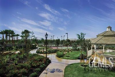 Undisclosed Address Bakersfield, CA 93306 - Photo 41 of 51 a view of a house with a yard and potted plants