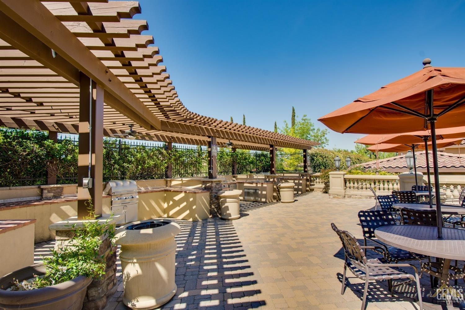 Undisclosed Address Bakersfield, CA 93306 - Photo 42 of 51 a view of a patio with swimming pool