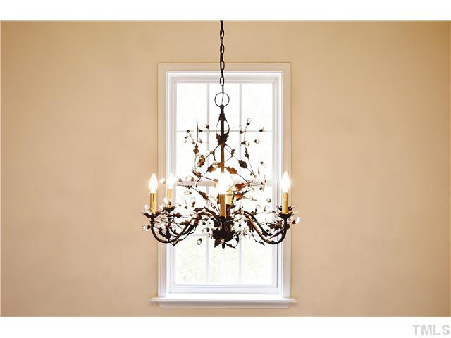 3723 Old Post Road Raleigh, NC 27612 - Photo 17 of 25 Here is the beautiful new bronze and crystal Ballard Design chandelier hanging in the 2 story foyer! Foyer