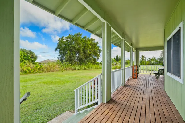 a view of a balcony with garden