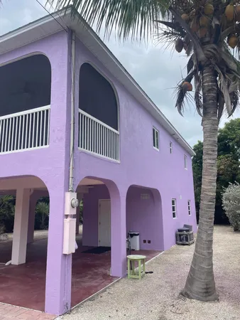 a front view of a house with yard