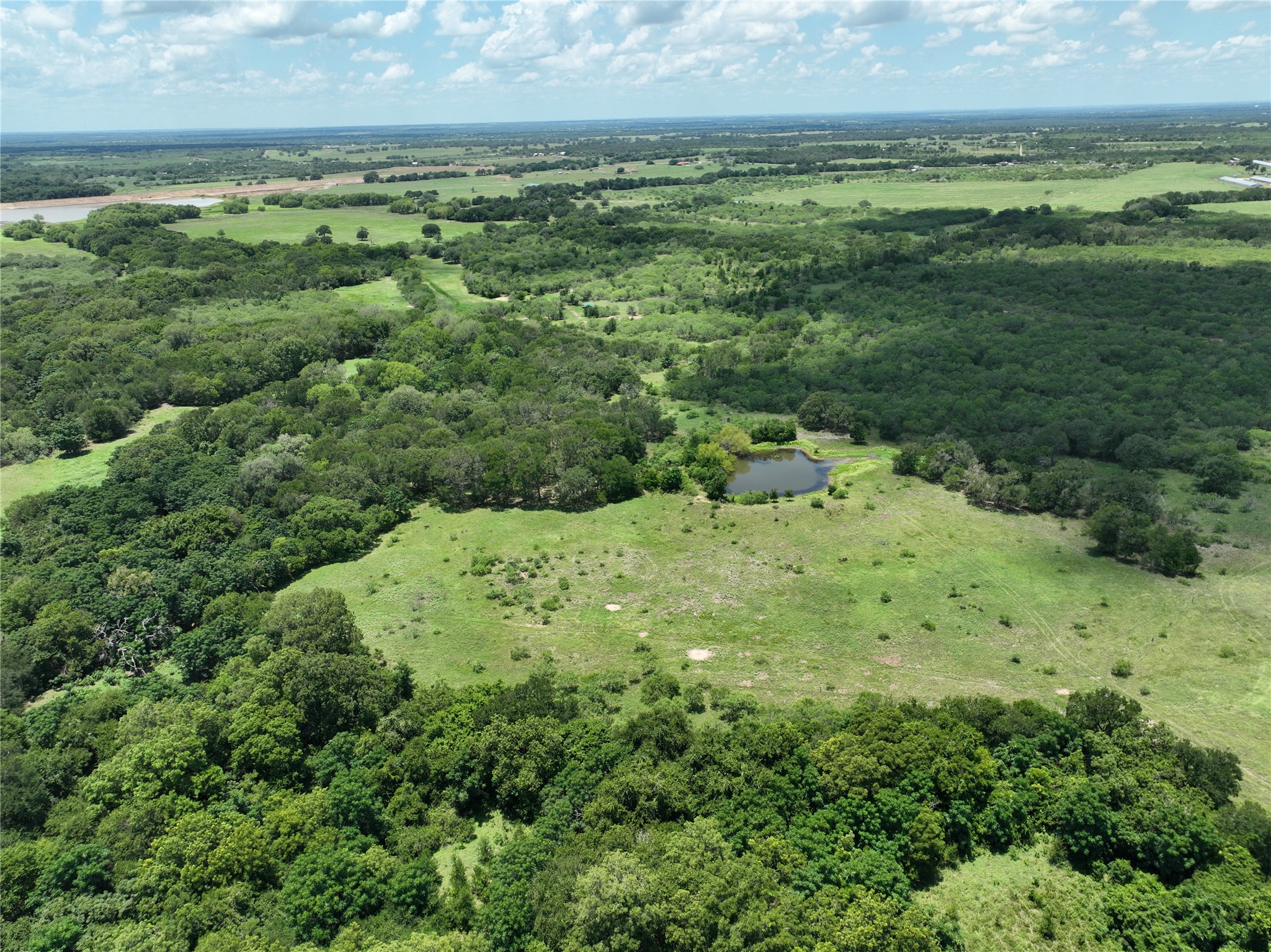 Tbd Lot 4 Tbd Road Dale, TX 78616 - Photo 18 of 24 Drone / aerial view of a forest