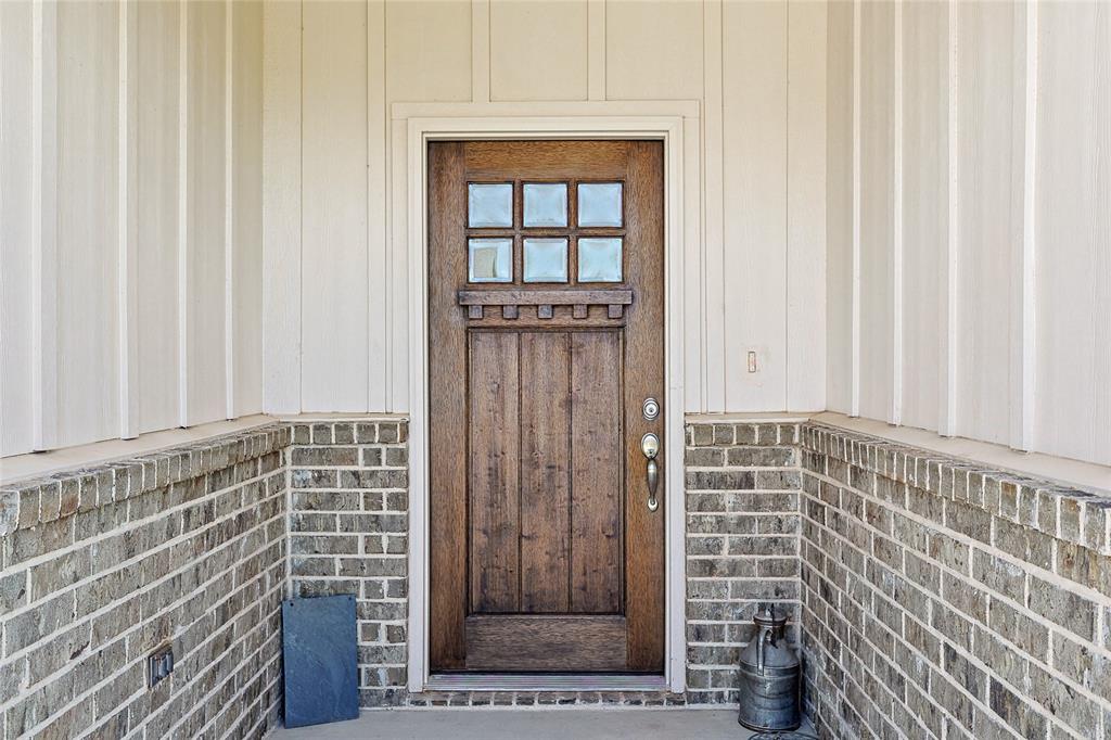 808 Feather Edge Drive Springtown, TX 76082 - Photo 5 of 40 a view of wooden door with a wooden door