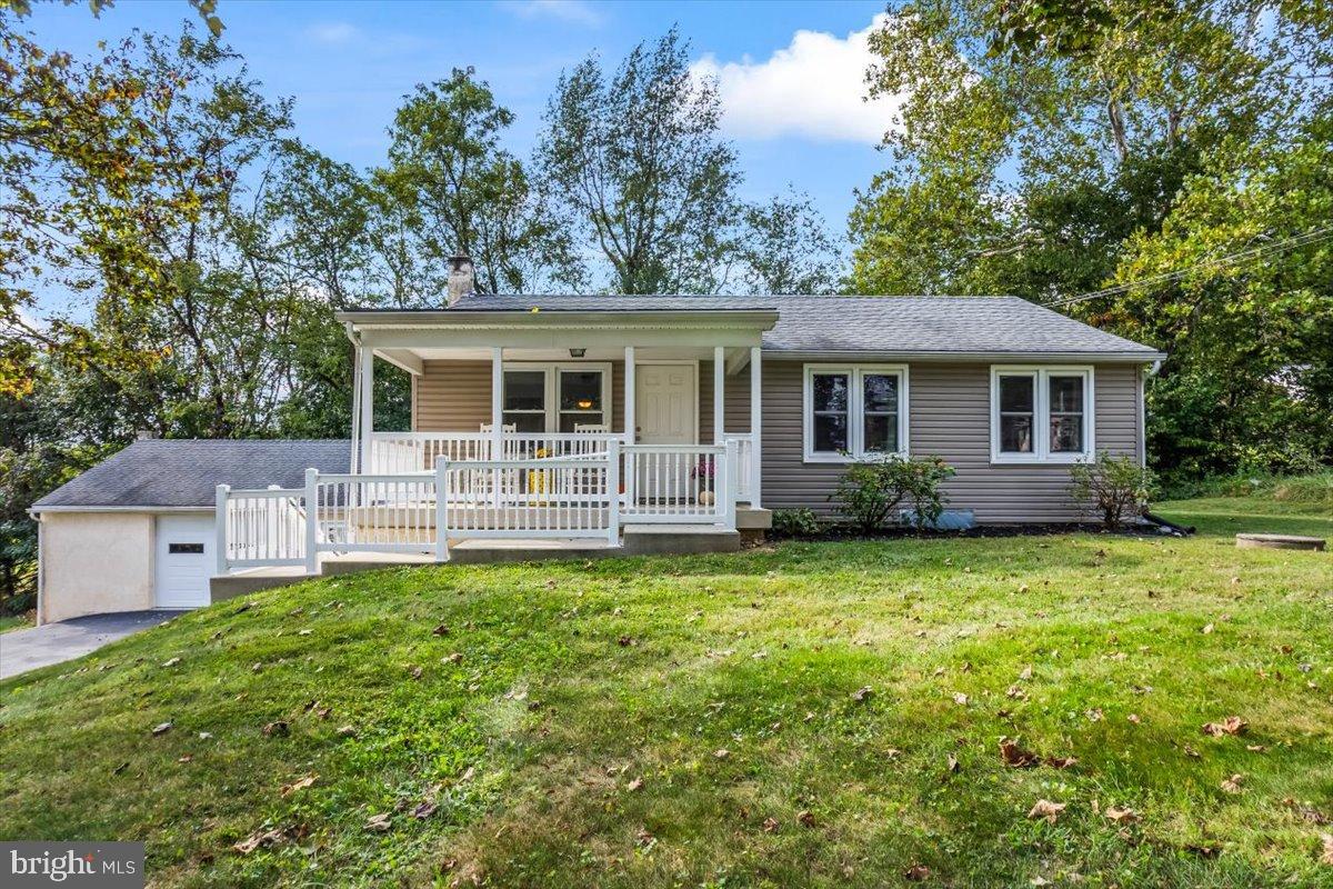 330 Sylvan Retreat Road Columbia, PA 17512 - Photo 1 of 26 Charming home with inviting porch and lush yard.