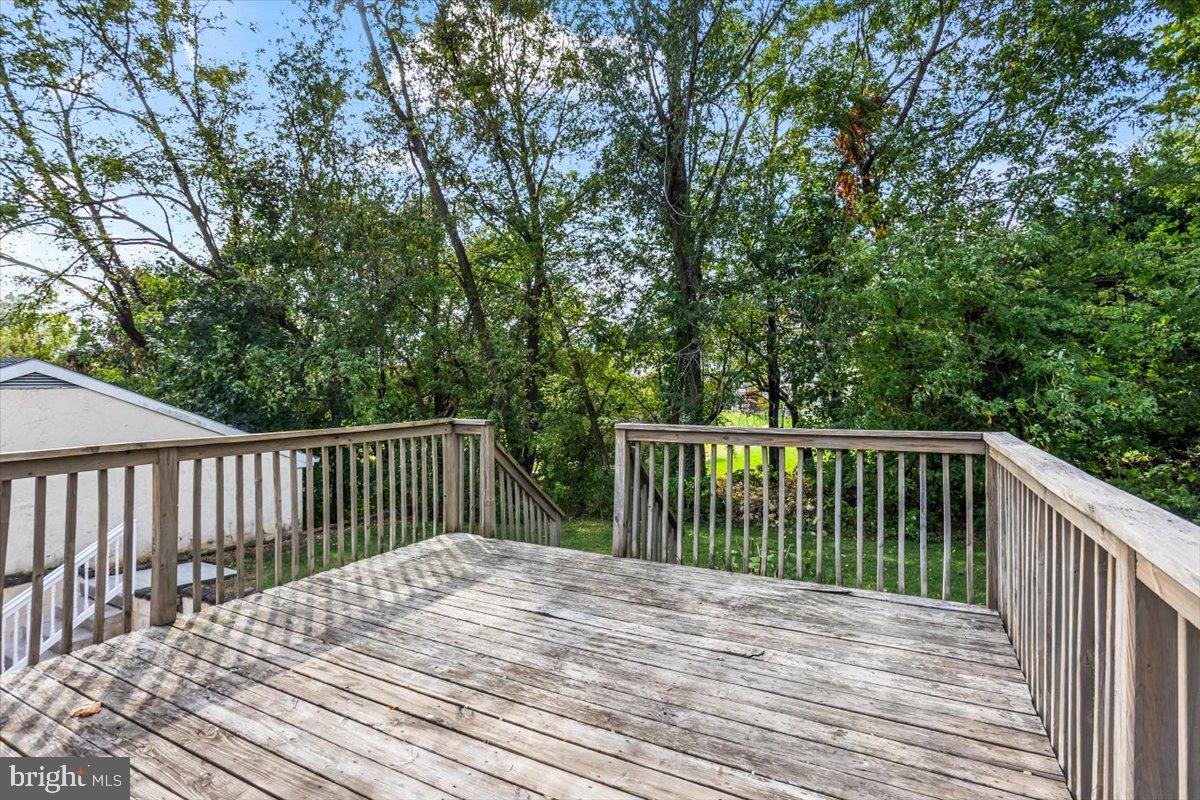 330 Sylvan Retreat Road Columbia, PA 17512 - Photo 22 of 26 Serene deck overlooking lush greenery.