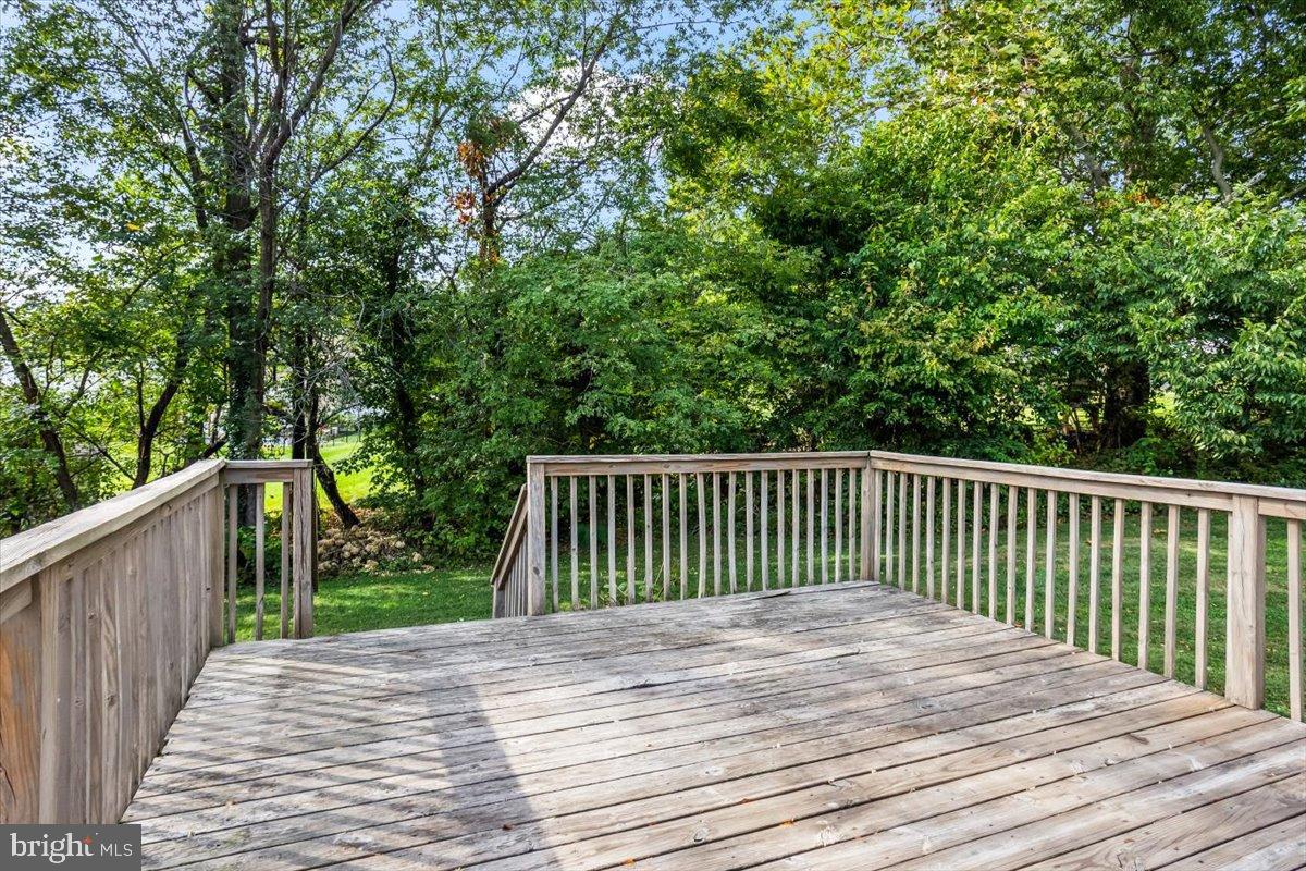 330 Sylvan Retreat Road Columbia, PA 17512 - Photo 23 of 26 Serene deck overlooking lush greenery.