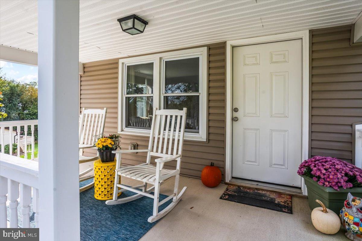 330 Sylvan Retreat Road Columbia, PA 17512 - Photo 4 of 26 Charming porch with seasonal accents.