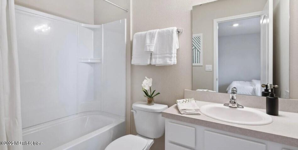 67 Blue Hvn Road St. Augustine, FL 32095 - Photo 15 of 24 a bathroom with a sink toilet and shower