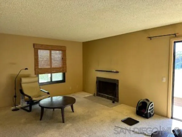 2258 Caminito Pescado, Unit 11 San Diego, CA 92107 - Photo 11 of 13 a workspace with furniture and a window