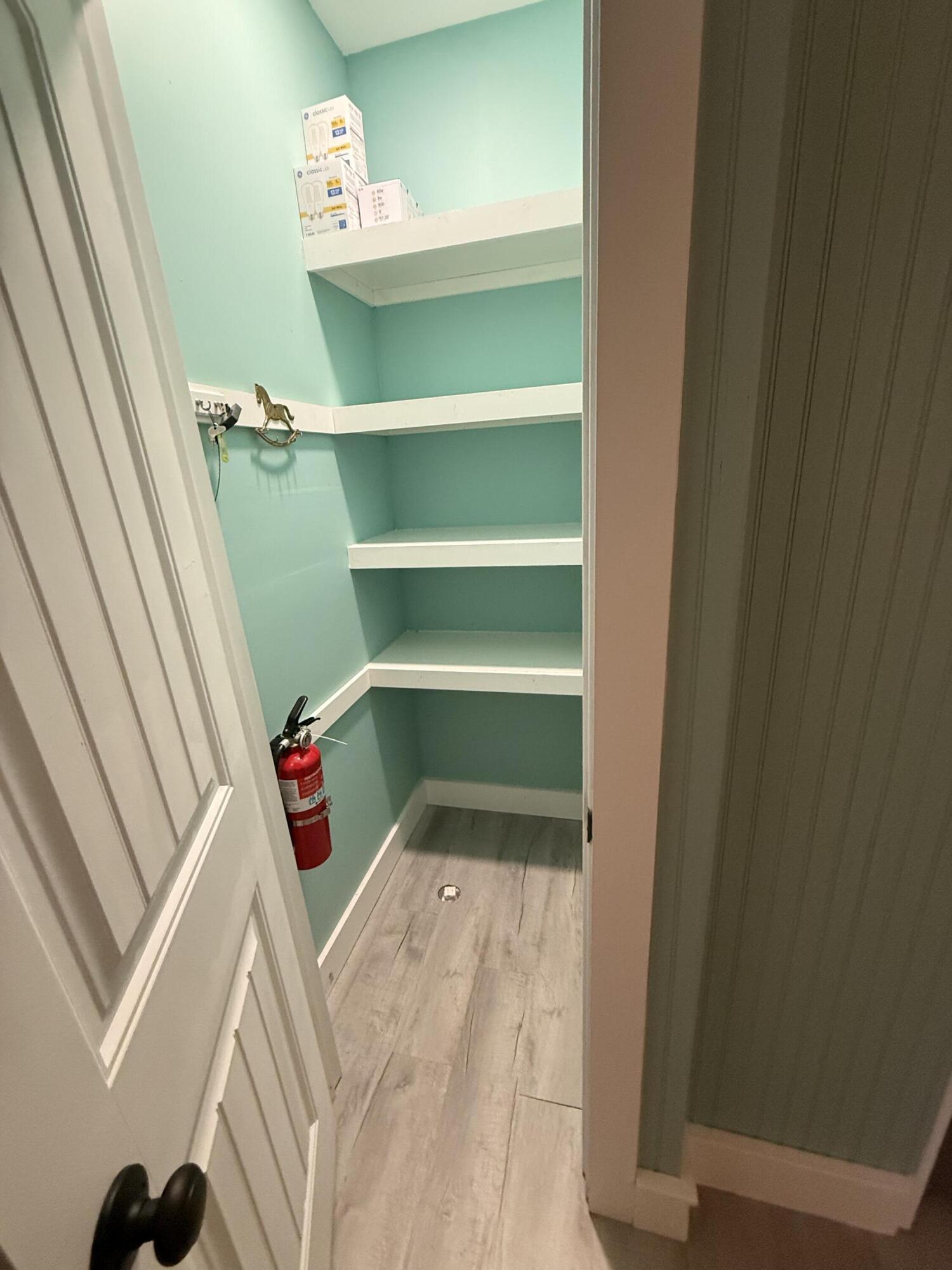 357 North Windsor Road Windsor, SC 29856 - Photo 10 of 20 a room with a fireplace and cabinets