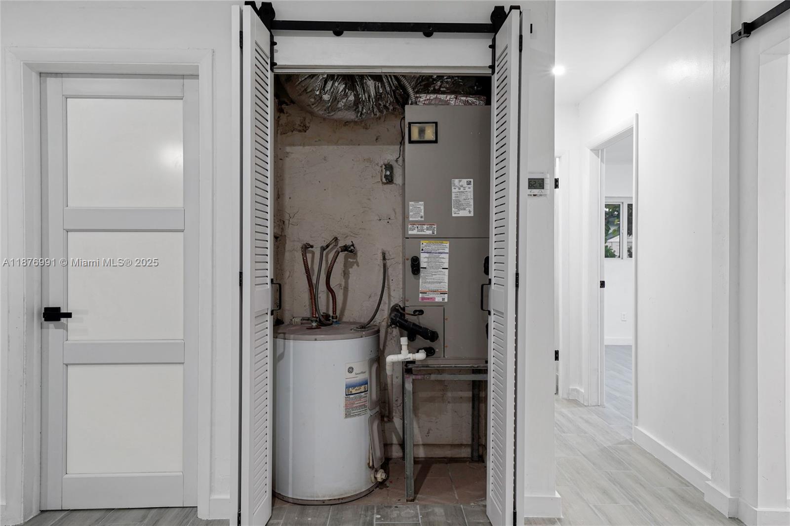 7516 Northwest 44th Court, Unit B Coral Springs, FL 33065 - Photo 20 of 26 a view of a storage & utility room