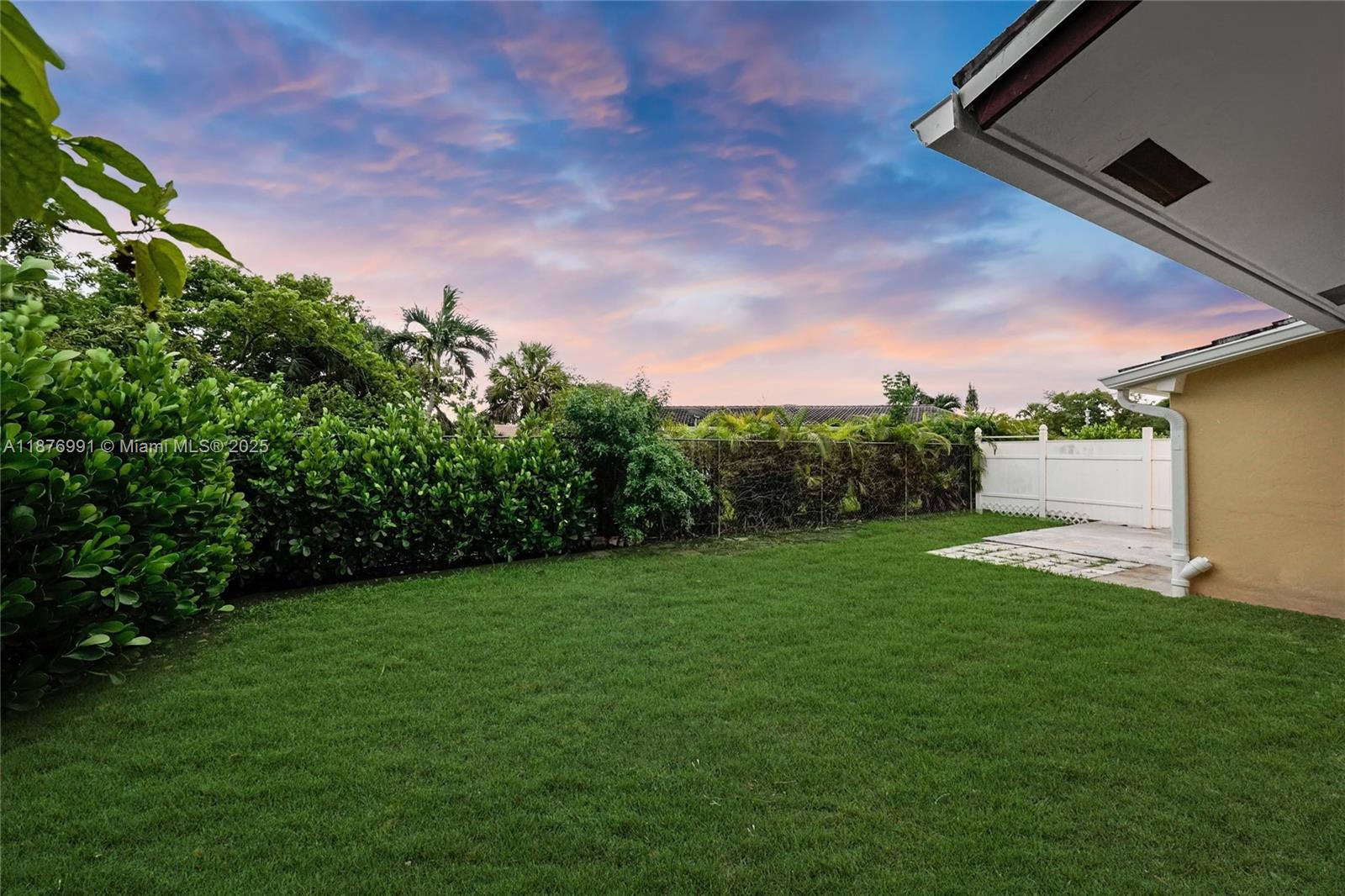 7516 Northwest 44th Court, Unit B Coral Springs, FL 33065 - Photo 24 of 26 a view of a backyard