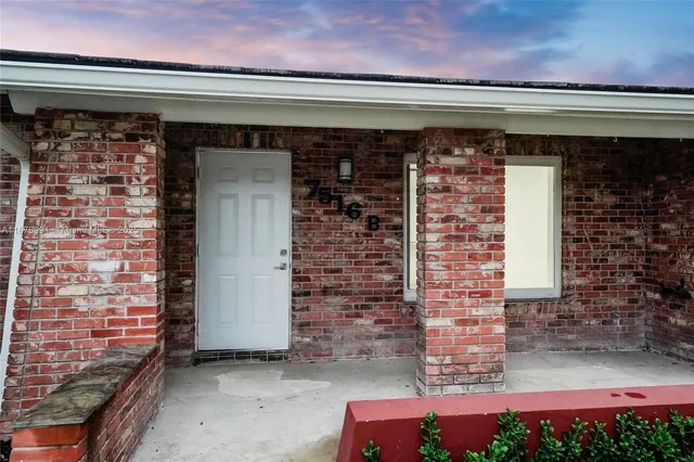 a front view of a house with entryway