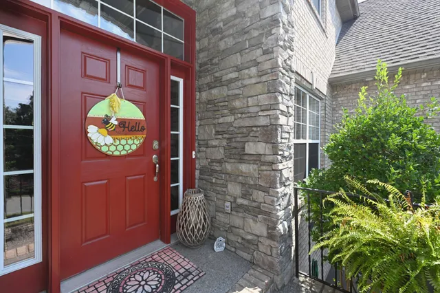 a aerial view of a house with a yard