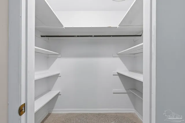 a bathroom with a shower and a sink