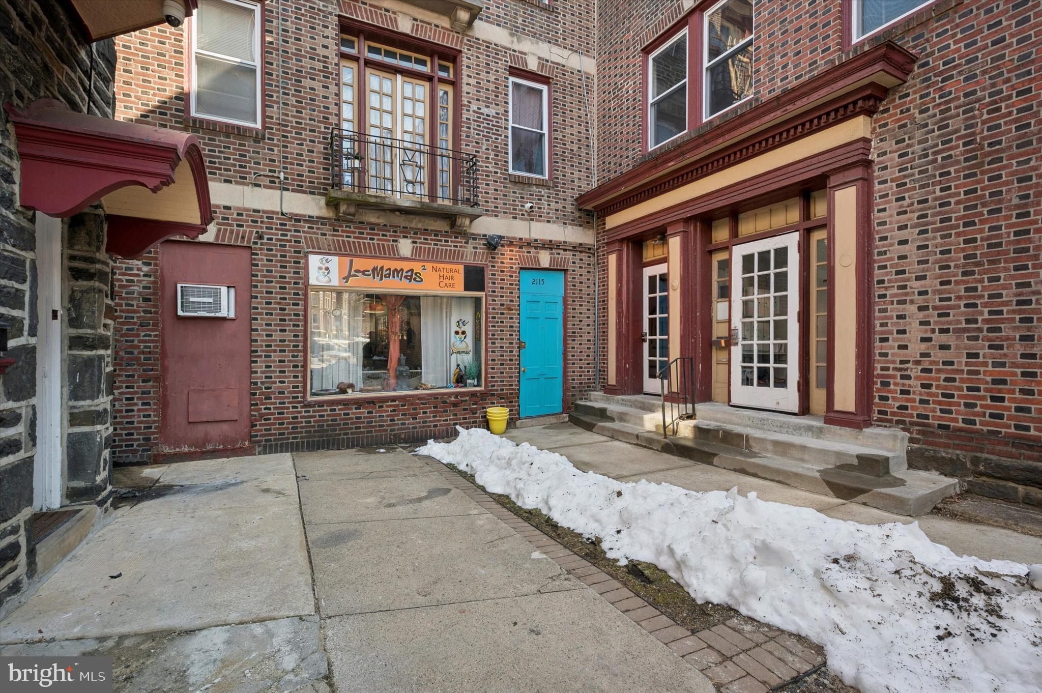 2115 North 63rd Street Philadelphia, PA 19151 - Photo 6 of 16 front view of a brick building
