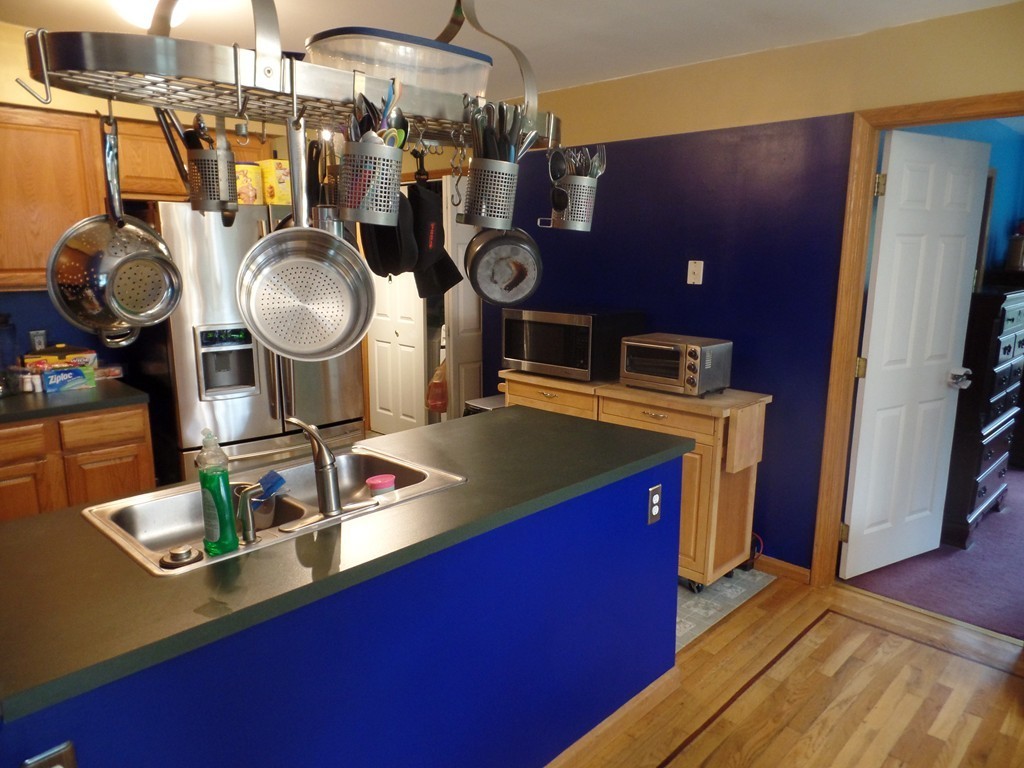 207 Turnpike Road Montague, MA 01376 - Photo 11 of 22 a kitchen with sink refrigerator and stove