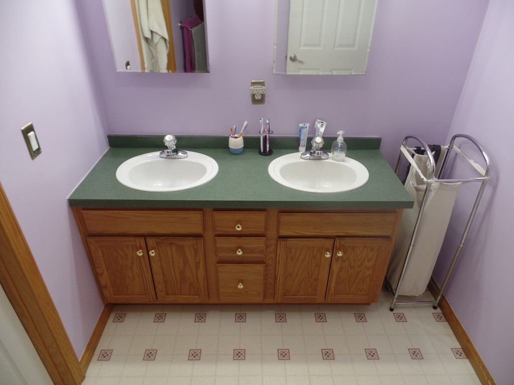 207 Turnpike Road Montague, MA 01376 - Photo 15 of 22 a bathroom with a sink double vanity and a mirror