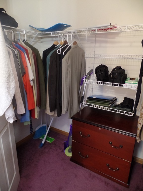 207 Turnpike Road Montague, MA 01376 - Photo 17 of 22 a view of walk in closet with clothes and shoes