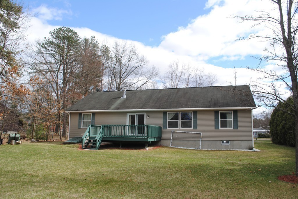 207 Turnpike Road Montague, MA 01376 - Photo 22 of 22 a view of a house with a big yard and large tree