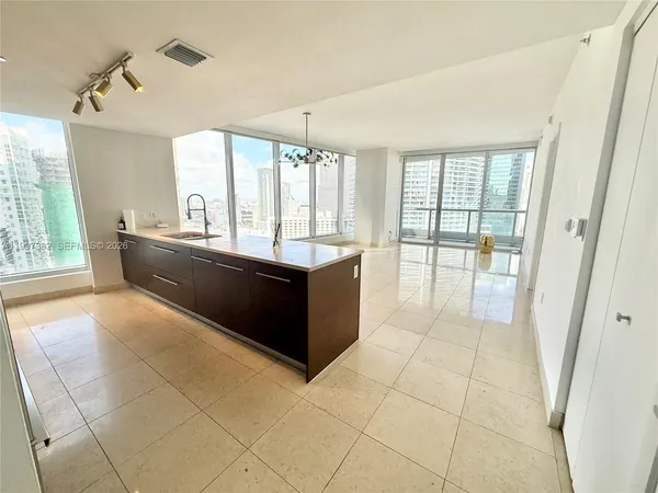 a large white room with a large window