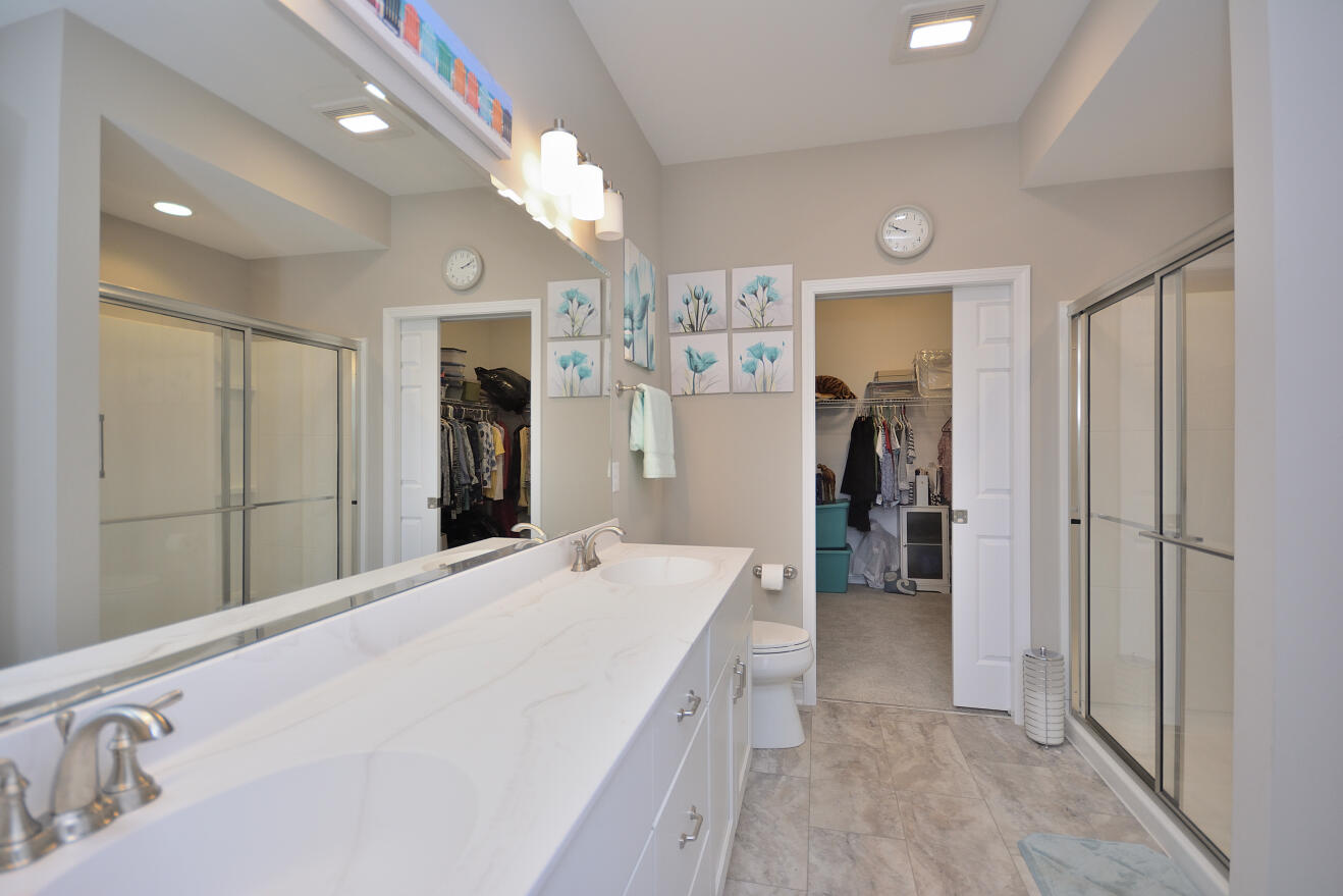 4380 Nighthawk Trail Brookfield, WI 53005 - Photo 14 of 37 Double vanity, walk in shower, oversized linen closet, attached walk-in closet