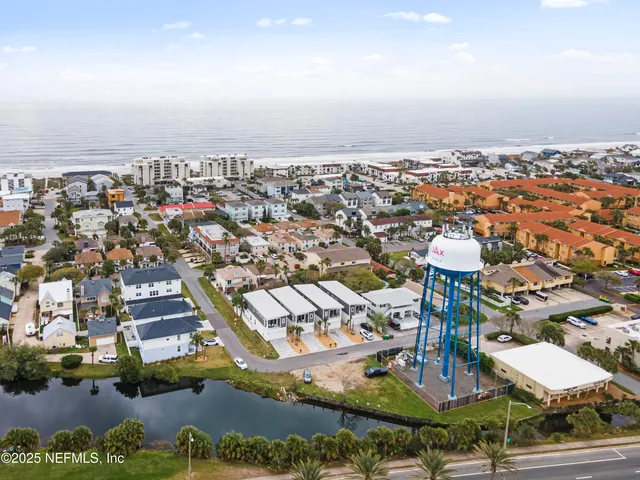 an aerial view of a city with lots of residential buildings