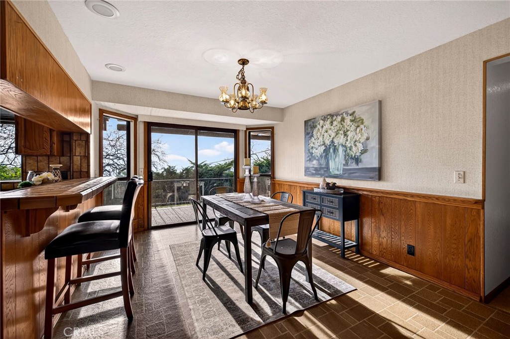 4139 Hidden Valley Road Butte Valley, CA 95965 - Photo 15 of 75 a view of a dining room with furniture window and outside view