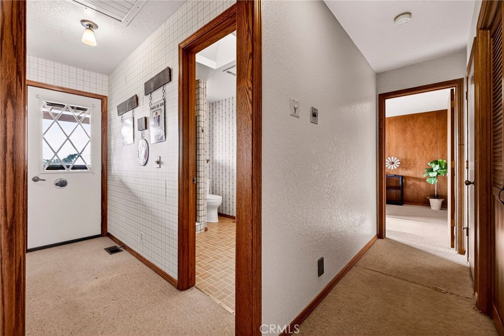 4139 Hidden Valley Road Butte Valley, CA 95965 - Photo 26 of 75 a view of a hallway with bathroom and front door
