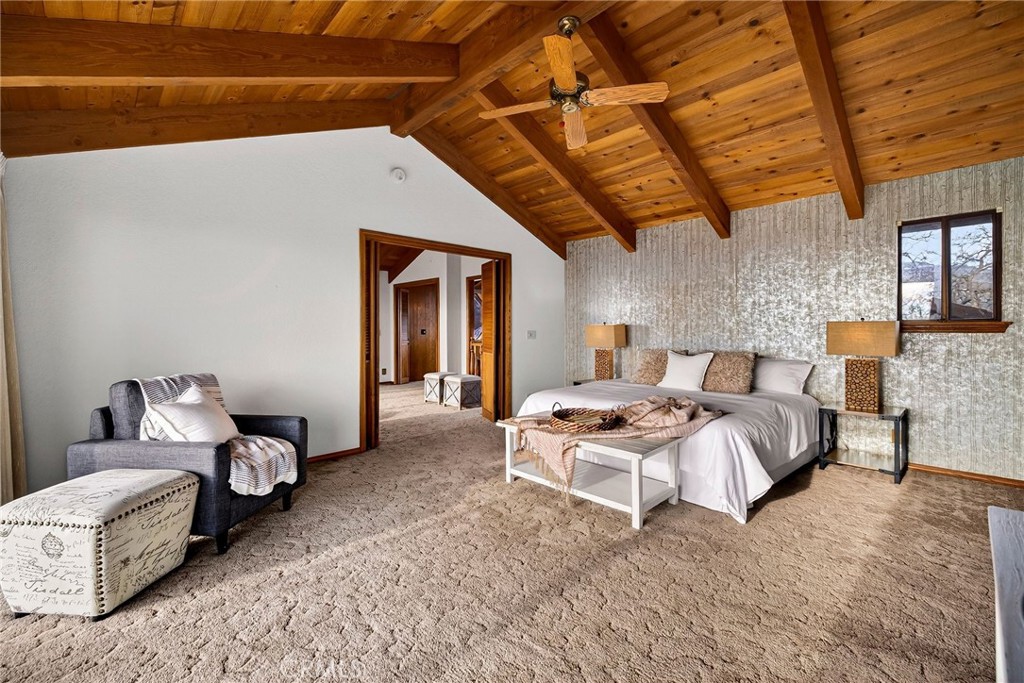 4139 Hidden Valley Road Butte Valley, CA 95965 - Photo 40 of 75 a bedroom with a bed and wooden floor