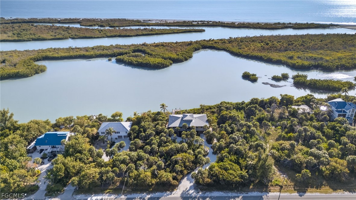 5703 Sanibel Captiva Road Sanibel, FL 33957 - Photo 42 of 50 a view of a lake with a mountain view