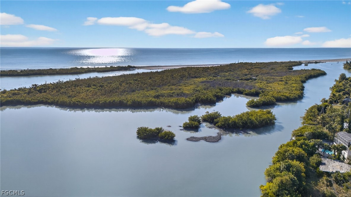 5703 Sanibel Captiva Road Sanibel, FL 33957 - Photo 43 of 50 a view of lake with mountain and lake view