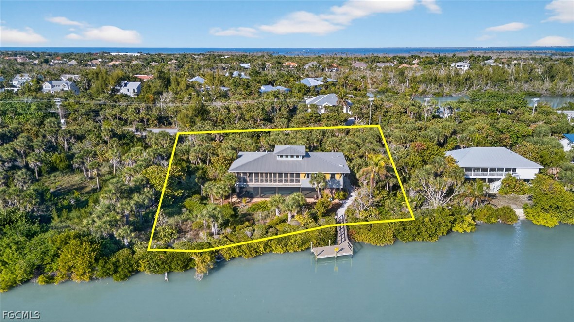 5703 Sanibel Captiva Road Sanibel, FL 33957 - Photo 47 of 50 an aerial view of residential houses with outdoor space