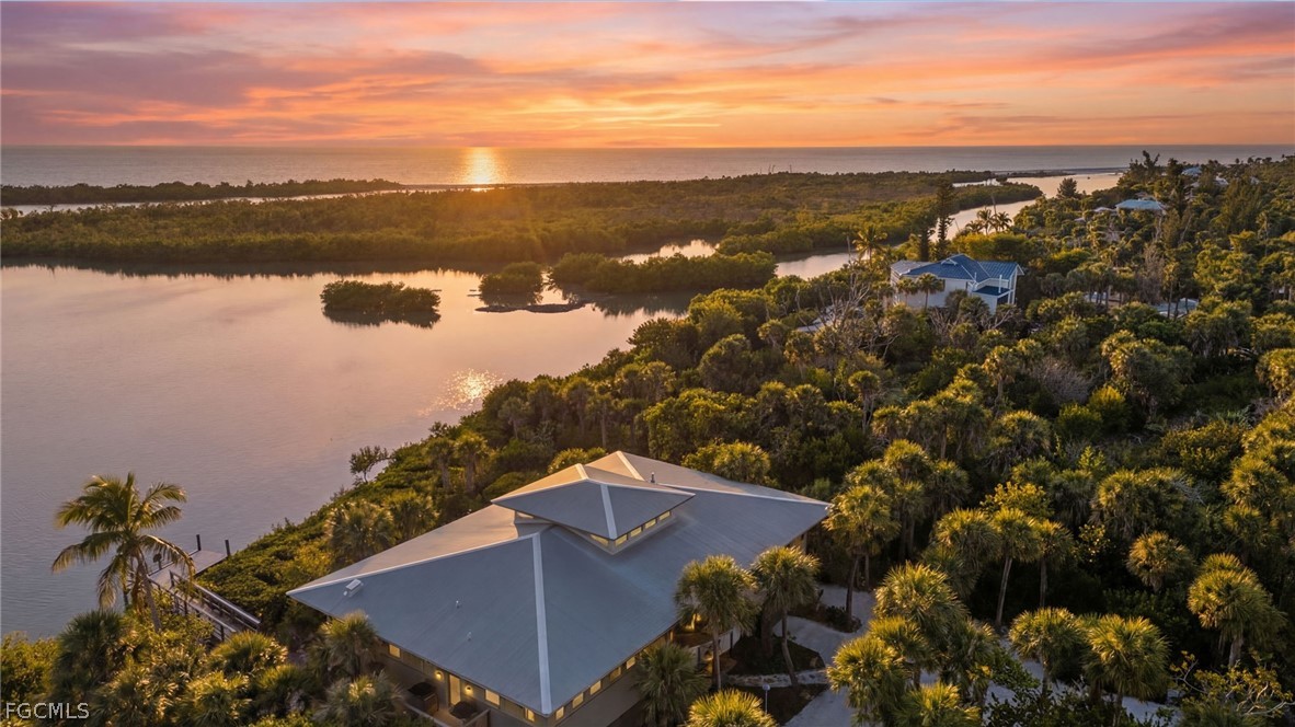 5703 Sanibel Captiva Road Sanibel, FL 33957 - Photo 50 of 50 a view of a city from a lake