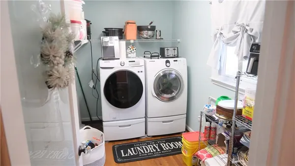 a utility room with dryer and washer