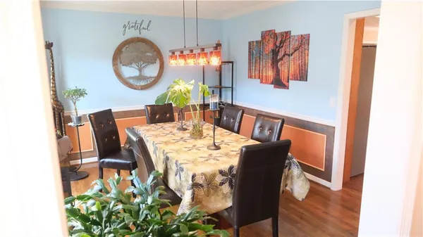 a view of a dining room with furniture