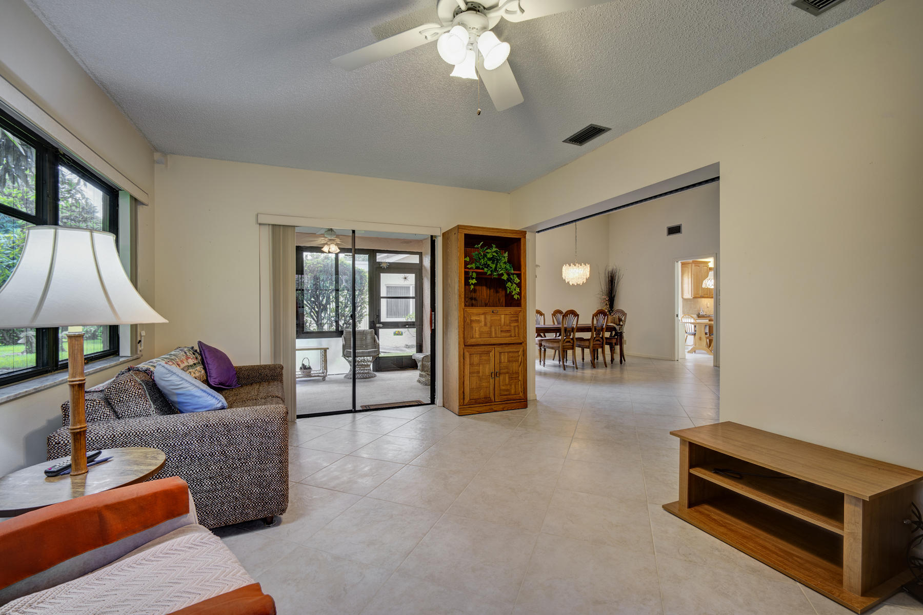 7818 Cloverfield Circle Boca Raton, FL 33433 - Photo 13 of 36 Florida Room leading to Enclosed Patio