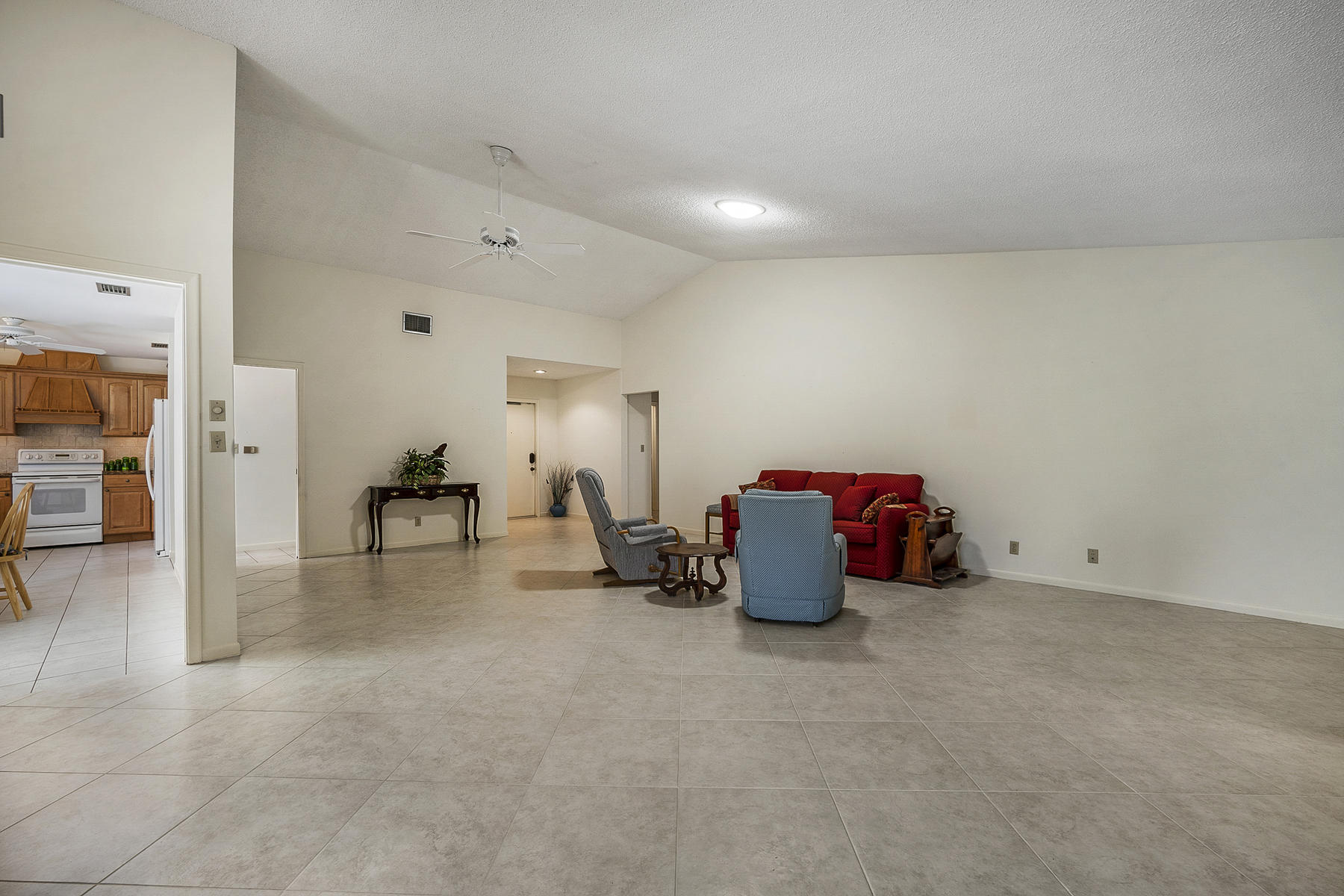 7818 Cloverfield Circle Boca Raton, FL 33433 - Photo 27 of 36 Living Room with view of Entrance Foyer