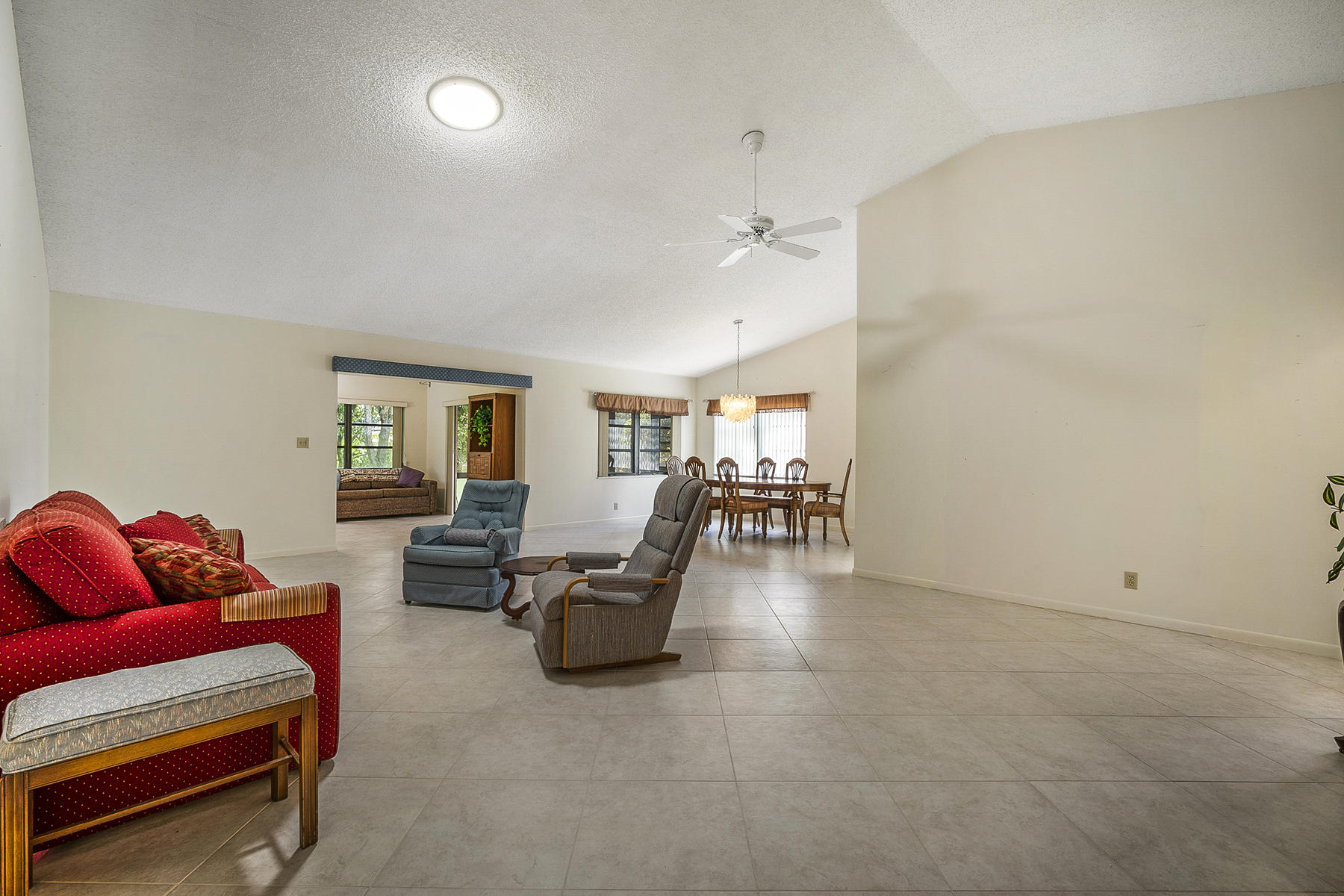 7818 Cloverfield Circle Boca Raton, FL 33433 - Photo 3 of 36 Vaulted Ceiling Living & Dining Room