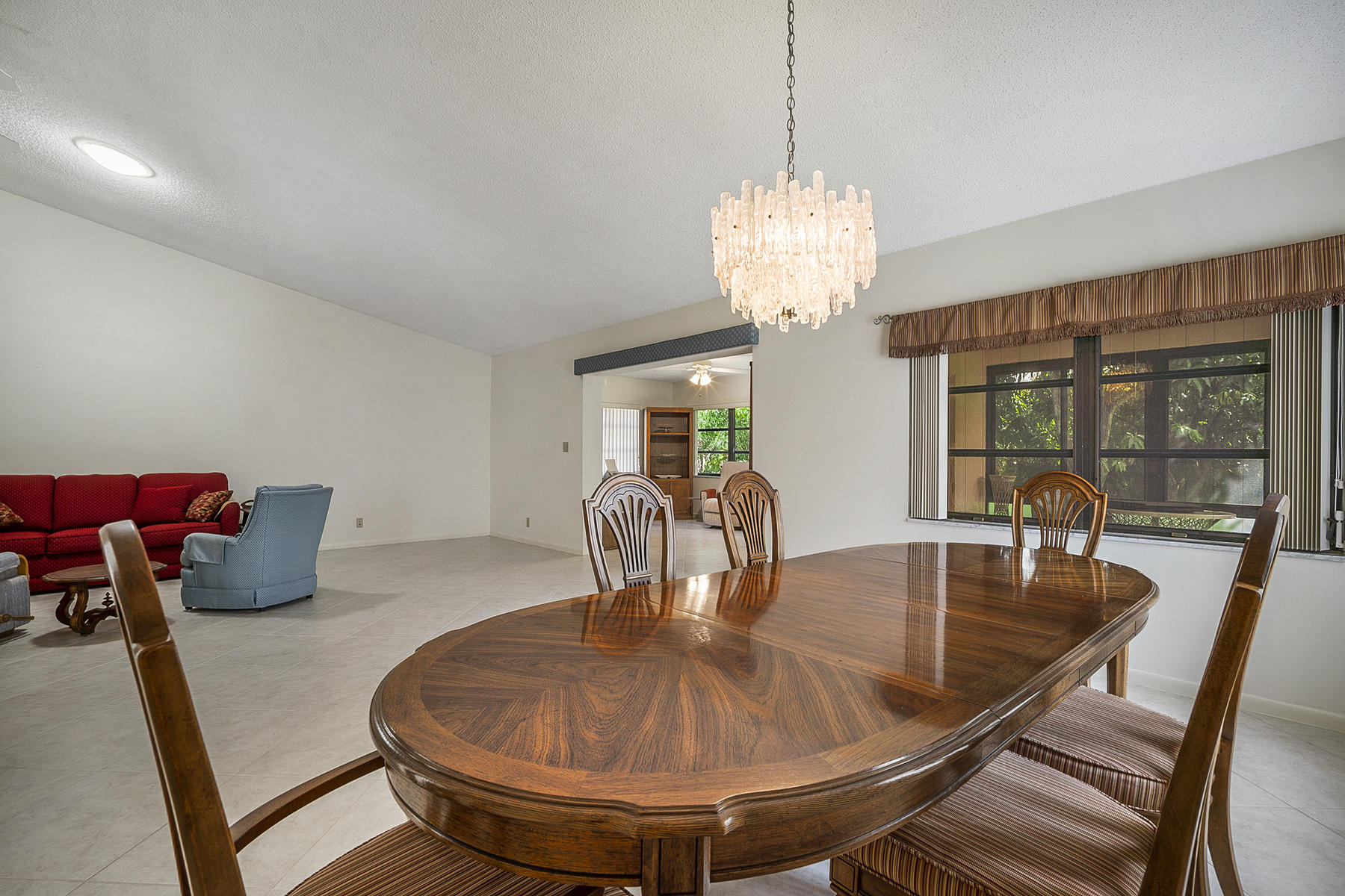 7818 Cloverfield Circle Boca Raton, FL 33433 - Photo 6 of 36 Dining Room overlooking Enclosed Patio