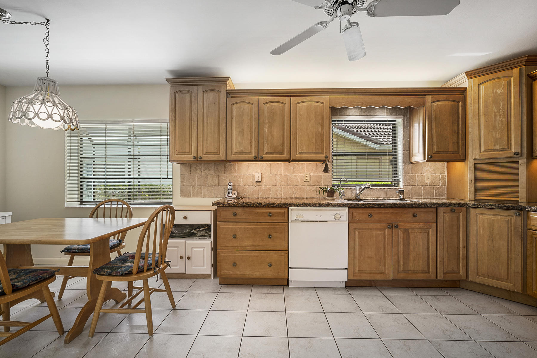 7818 Cloverfield Circle Boca Raton, FL 33433 - Photo 8 of 36 Maple Cabinet Kitchen