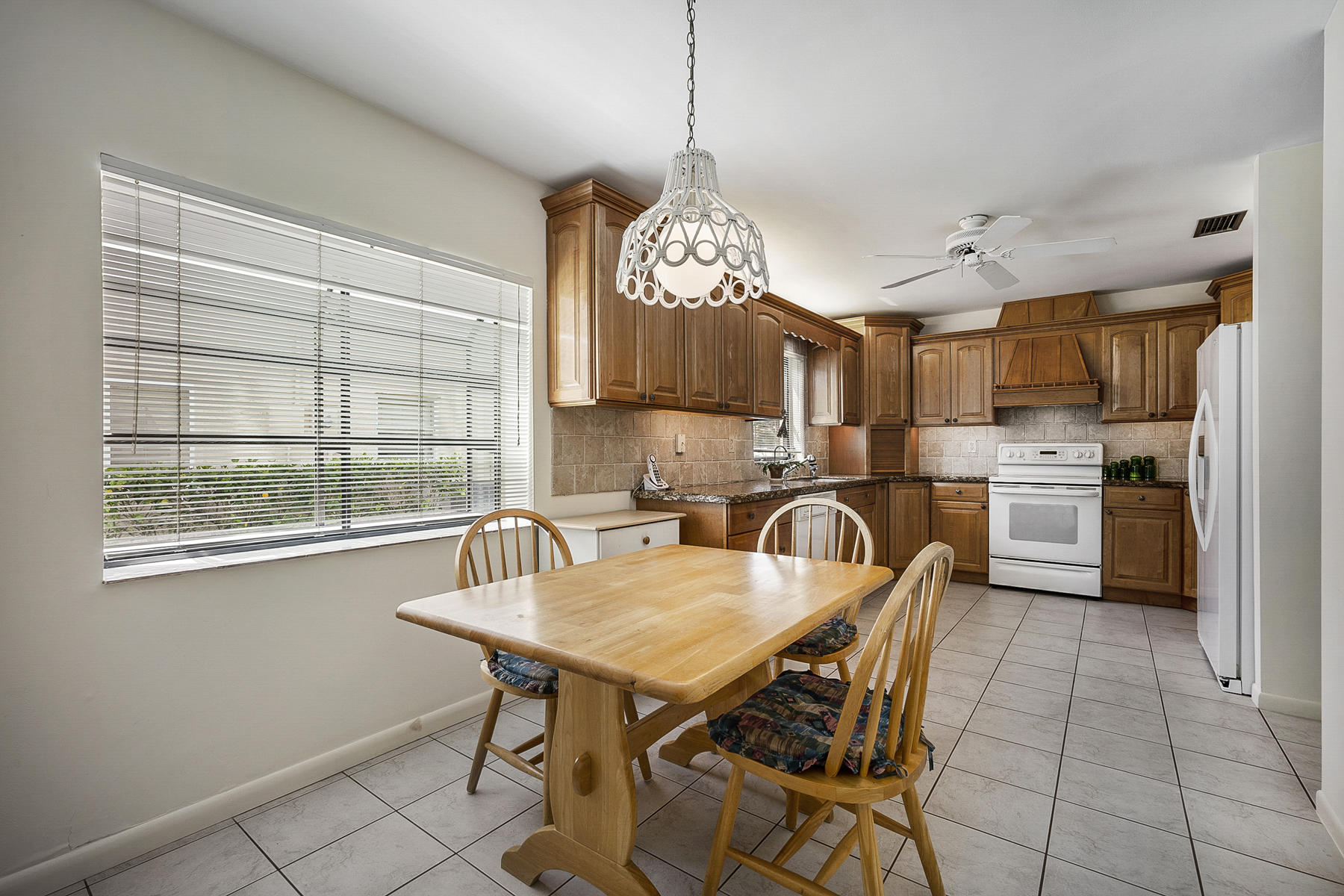 7818 Cloverfield Circle Boca Raton, FL 33433 - Photo 10 of 36 Eat-in Kitchen Area