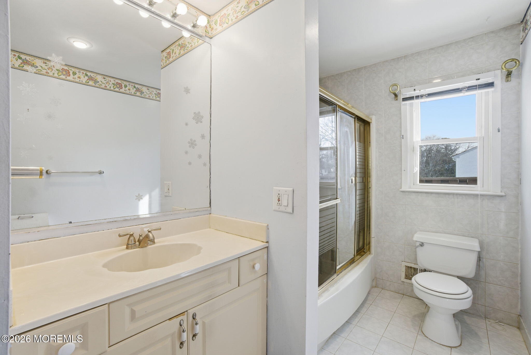 708 Auth Avenue Oakhurst, NJ 07755 - Photo 19 of 29 a bathroom with a sink a toilet and shower