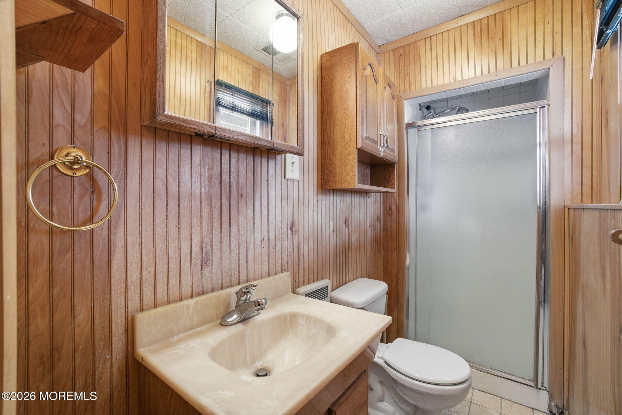 708 Auth Avenue Oakhurst, NJ 07755 - Photo 20 of 29 a bathroom with a sink a toilet and shower