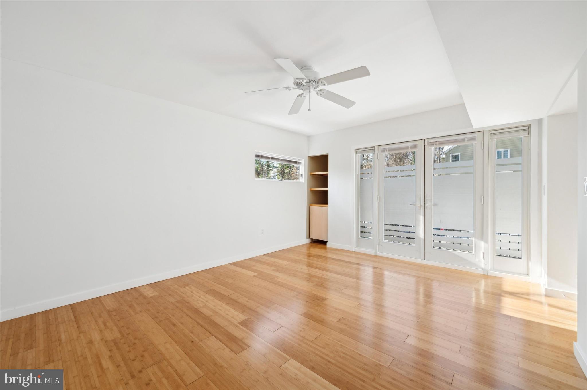 29 Rolling Road Wynnewood, PA 19096 - Photo 14 of 25 a view of an empty room with wooden floor