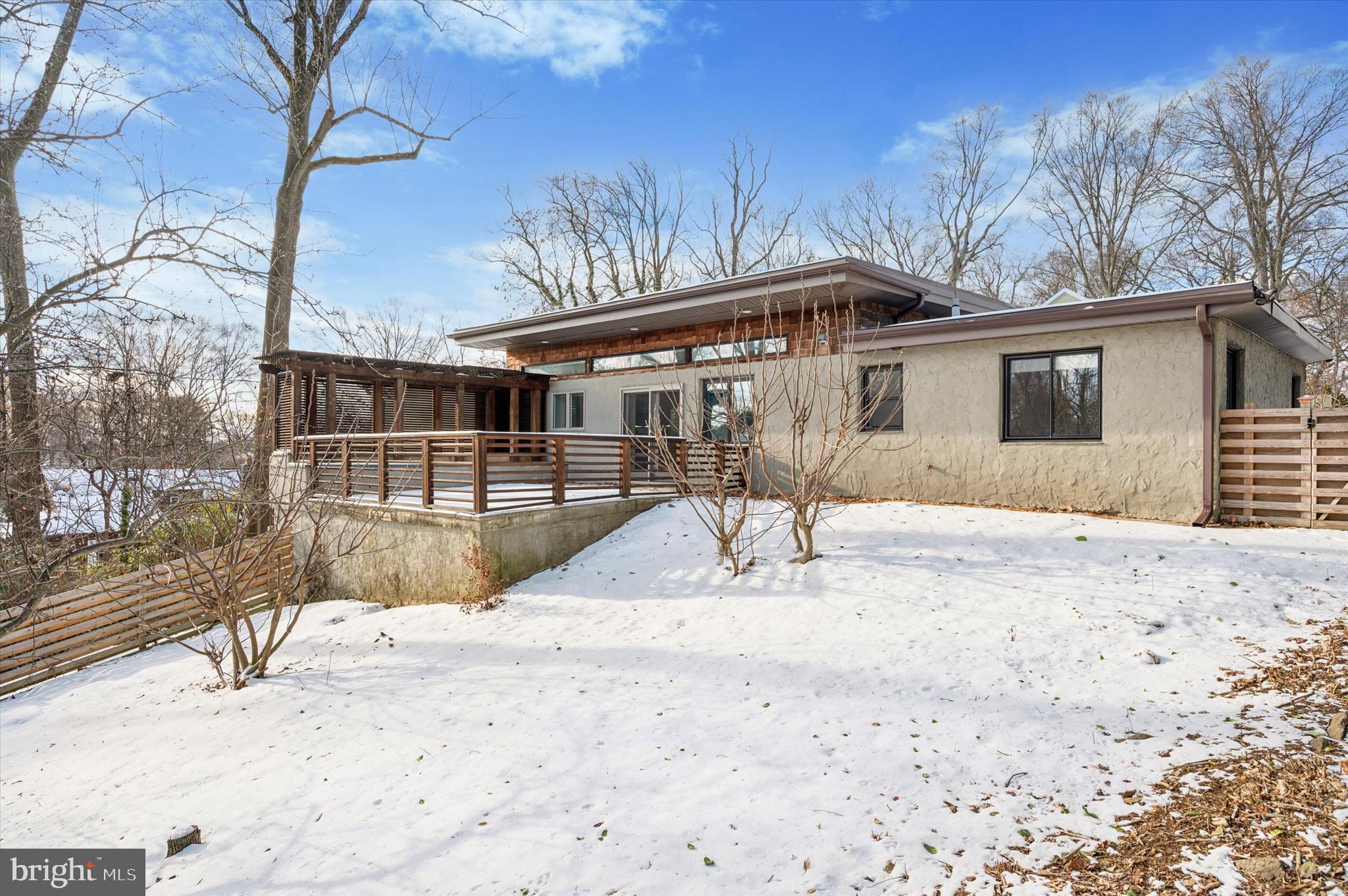 29 Rolling Road Wynnewood, PA 19096 - Photo 2 of 25 a view of a house with a snow in the background