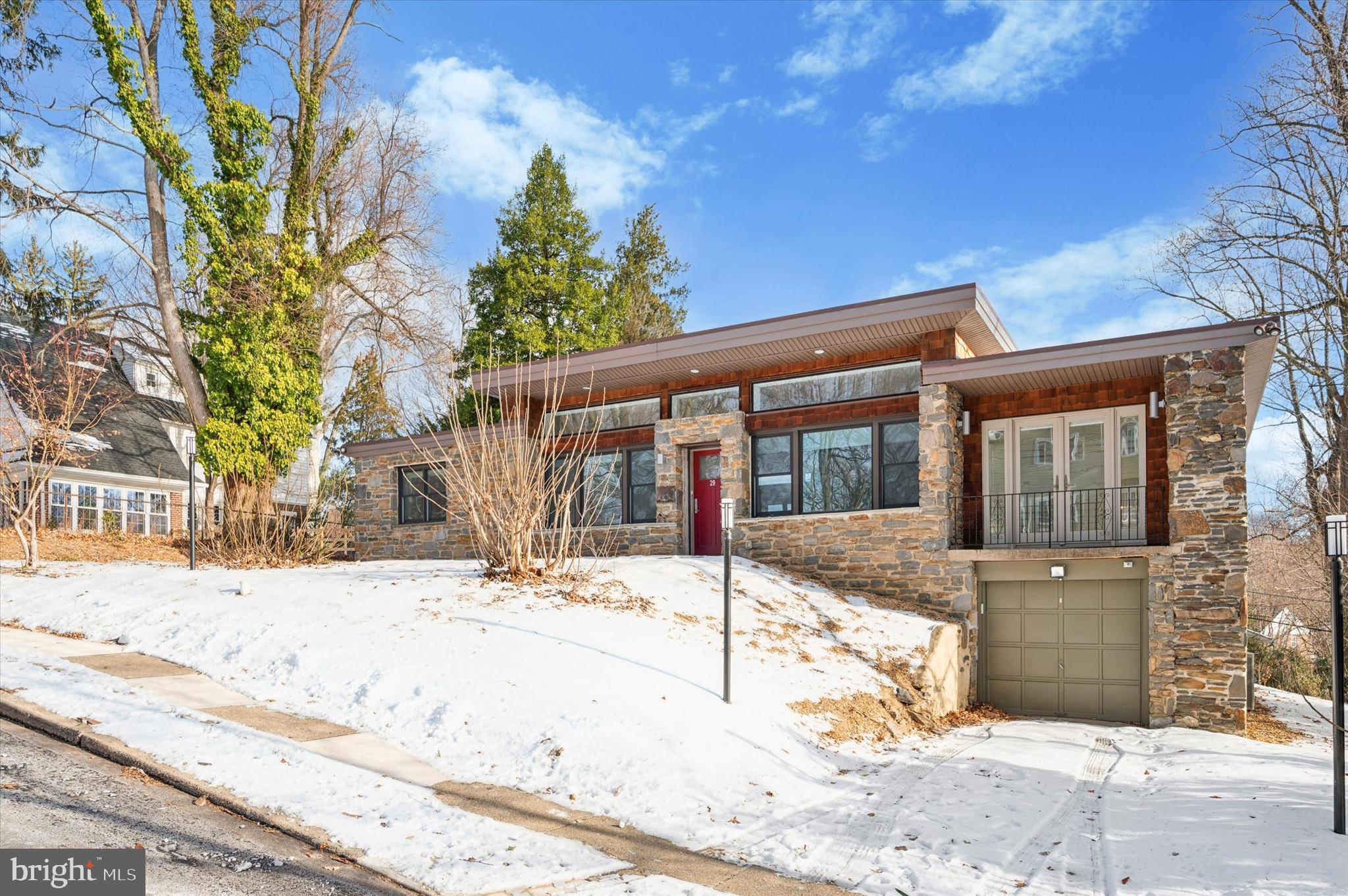 29 Rolling Road Wynnewood, PA 19096 - Photo 25 of 25 a view of a house with snow on the road