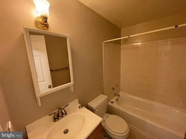 an empty room with a hallway